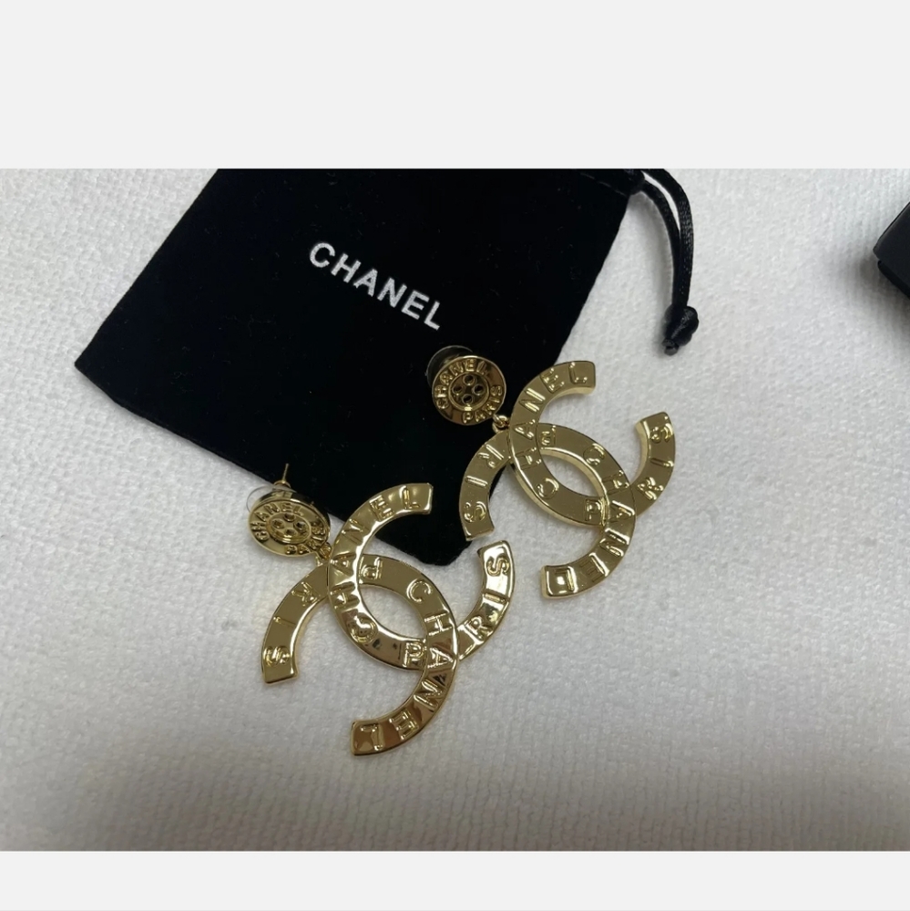 Authentic Chanel gold button drop earrings